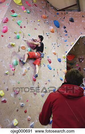 Japanese climbing athlete in action View Large Photo Image Stock Image - Japanese climbing athlete in action. Fotosearch