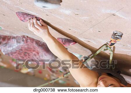Japanese climbing athlete in action View Large Photo Image Stock Photo - Japanese climbing athlete in action. Fotosearch