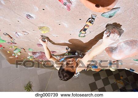 Japanese climbing athlete in action View Large Photo Image Stock Photo - Japanese climbing athlete in action. Fotosearch