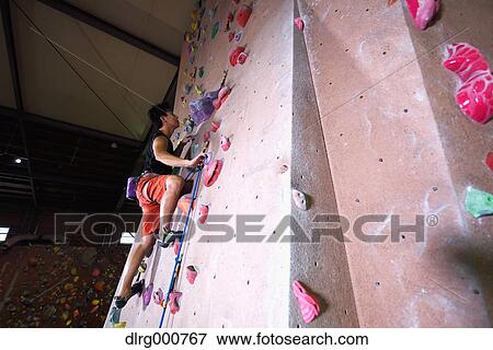 Japanese climbing athlete in action View Large Photo Image Stock Photo - Japanese climbing athlete in action. Fotosearch