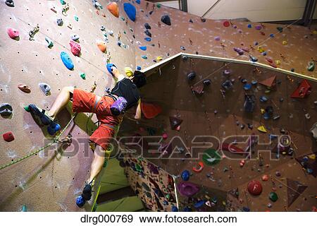 Japanese climbing athlete in action View Large Photo Image Stock Photo - Japanese climbing athlete in action. Fotosearch