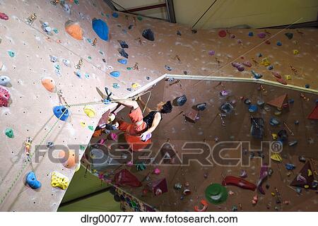 Japanese climbing athlete in action View Large Photo Image Stock Photo - Japanese climbing athlete in action. Fotosearch