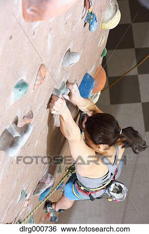 Japanese climbing athlete in action View Large Photo Image Stock Photograph - Japanese climbing athlete in action. Fotosearch