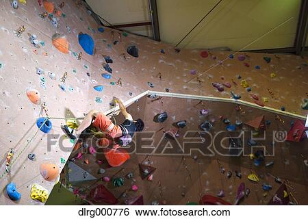 Japanese climbing athlete in action View Large Photo Image Stock Photograph - Japanese climbing athlete in action. Fotosearch