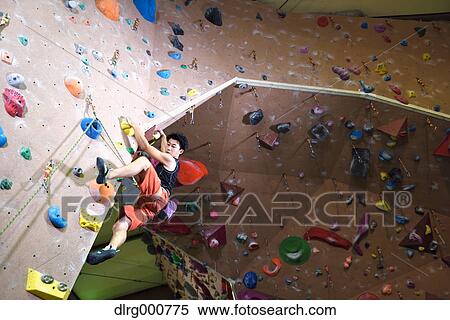 Japanese climbing athlete in action View Large Photo Image Stock Photography - Japanese climbing athlete in action. Fotosearch