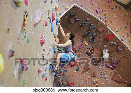 Japanese climbing athlete in action View Large Photo Image Stock Photography - Japanese climbing athlete in action. Fotosearch