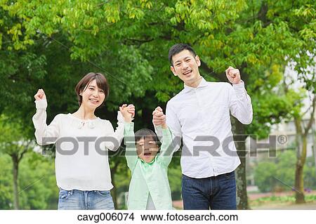 Japanese family in a city park View Large Photo Image Picture - Japanese family in a city park. Fotosearch
