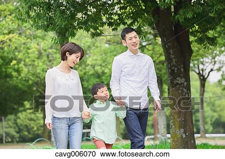 Japanese family in a city park View Large Photo Image Stock Image - Japanese family in a city park. Fotosearch