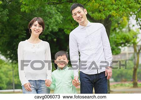 Japanese family in a city park View Large Photo Image Stock Image - Japanese family in a city park. Fotosearch