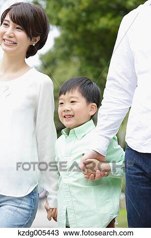 Japanese family in a city park View Large Photo Image Stock Image - Japanese family in a city park. Fotosearch