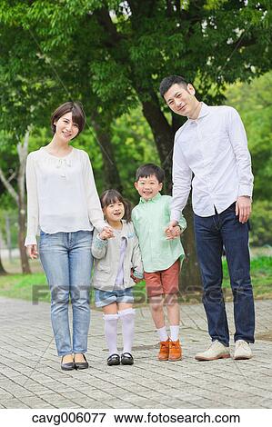 Japanese family in a city park View Large Photo Image Stock Photo - Japanese family in a city park. Fotosearch