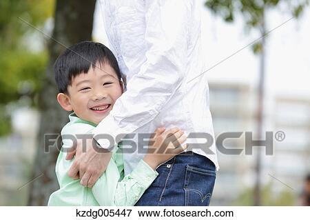 Japanese father and son in a city park View Large Photo Image Stock Photo - Japanese father and son in a city park. Fotosearch