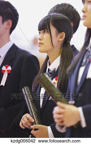 Stock Image - Japanese high school graduation ceremony. Fotosearch