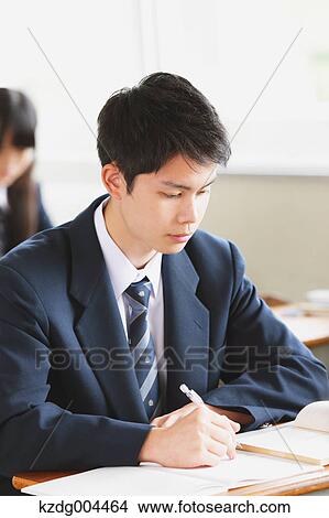 Picture - Japanese high-school student during a lesson. Fotosearch