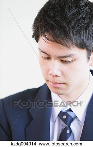 Picture - Japanese high-school student during a lesson. Fotosearch