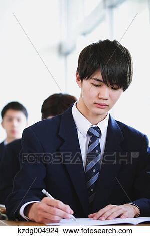 Picture - Japanese high-school student during a lesson. Fotosearch