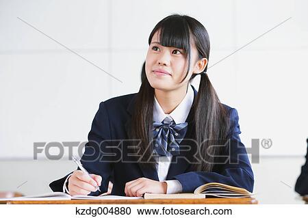 Japanese high-school student during a lesson View Large Photo Image Stock Image - Japanese high-school student during a lesson. Fotosearch