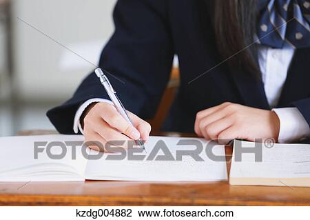 Japanese high-school student during a lesson View Large Photo Image Stock Image - Japanese high-school student during a lesson. Fotosearch