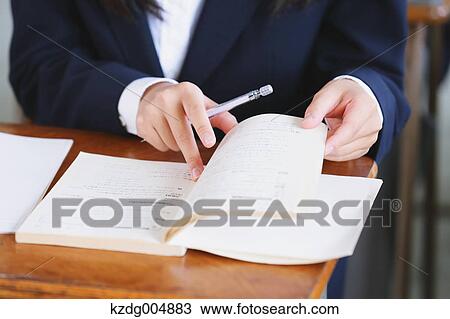 Japanese high-school student during a lesson View Large Photo Image Stock Image - Japanese high-school student during a lesson. Fotosearch