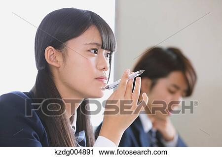 Japanese high-school student during a lesson View Large Photo Image Stock Image - Japanese high-school student during a lesson. Fotosearch