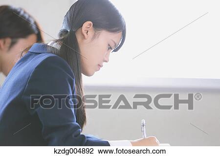 Japanese high-school student during a lesson View Large Photo Image Stock Image - Japanese high-school student during a lesson. Fotosearch