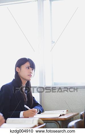 Japanese high-school student during a lesson View Large Photo Image Stock Image - Japanese high-school student during a lesson. Fotosearch