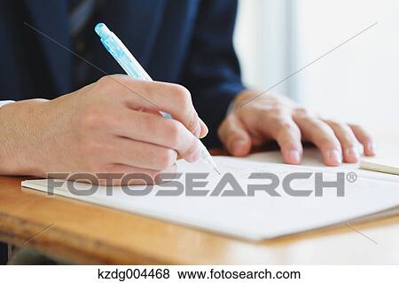 Stock Photo - Japanese high-school student during a lesson. Fotosearch