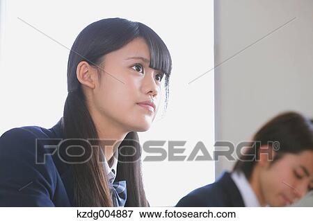 Stock Photo - Japanese high-school student during a lesson. Fotosearch