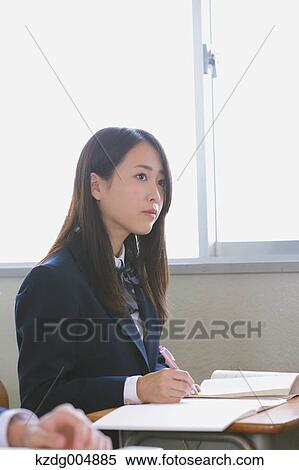 Stock Photography - Japanese high-school student during a lesson. Fotosearch