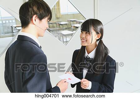 Japanese high-school student giving love letter View Large Photo Image Stock Image - Japanese high-school student giving love letter. Fotosearch