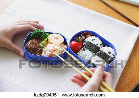 Japanese high-school student having bento in classroom View Large Photo Image Stock Image - Japanese high-school student having bento in classroom. Fotosearch