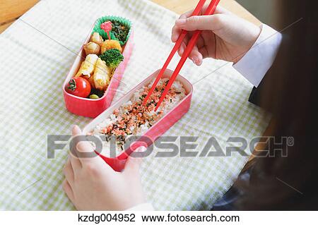 Japanese high-school student having bento in classroom View Large Photo Image Stock Image - Japanese high-school student having bento in classroom. Fotosearch