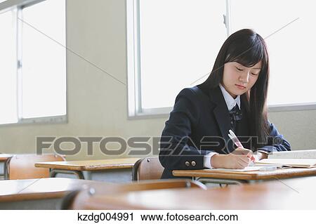 Japanese high-school student in empty classroom View Large Photo Image Stock Image - Japanese high-school student in empty classroom. Fotosearch