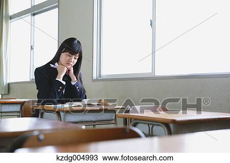 Japanese high-school student in empty classroom View Large Photo Image Stock Image - Japanese high-school student in empty classroom. Fotosearch