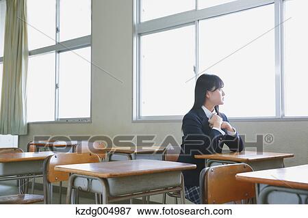 Japanese high-school student in empty classroom View Large Photo Image Stock Photo - Japanese high-school student in empty classroom. Fotosearch