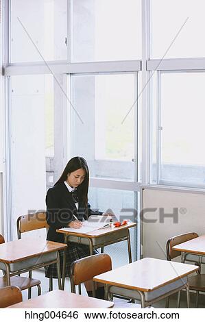 Japanese high-school student in empty classroom View Large Photo Image Stock Photograph - Japanese high-school student in empty classroom. Fotosearch