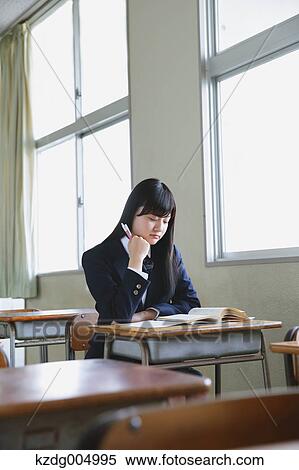 Japanese high-school student in empty classroom View Large Photo Image Stock Photography - Japanese high-school student in empty classroom. Fotosearch