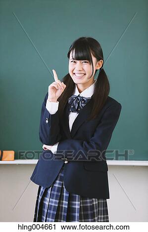 Japanese high-school student in front of classroom blackboard View Large Photo Image Stock Image - Japanese high-school student in front of classroom blackboard. Fotosearch