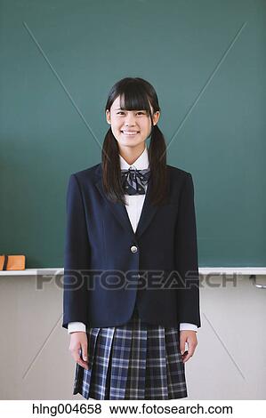 Japanese high-school student in front of classroom blackboard View Large Photo Image Stock Photo - Japanese high-school student in front of classroom blackboard. Fotosearch