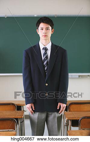 Japanese high-school student in front of classroom blackboard View Large Photo Image Stock Photo - Japanese high-school student in front of classroom blackboard. Fotosearch