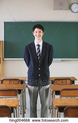 Japanese high-school student in front of classroom blackboard View Large Photo Image Stock Photo - Japanese high-school student in front of classroom blackboard. Fotosearch