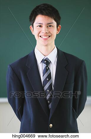 Japanese high-school student in front of classroom blackboard View Large Photo Image Stock Photo - Japanese high-school student in front of classroom blackboard. Fotosearch