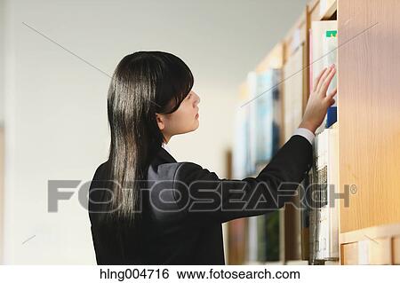 Japanese high-school student in the school library View Large Photo Image Stock Photograph - Japanese high-school student in the school library. Fotosearch