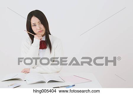 Japanese High-school student in uniform against white background View Large Photo Image Picture - Japanese High-school student in uniform against white background. Fotosearch