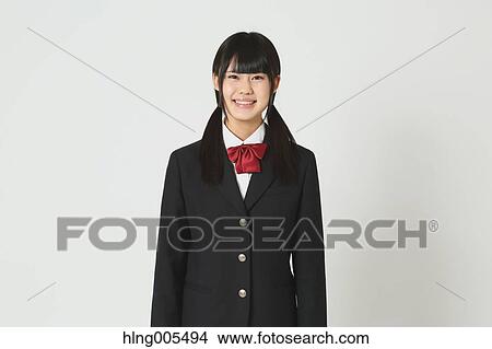 Japanese High-school student in uniform against white background View Large Photo Image Picture - Japanese High-school student in uniform against white background. Fotosearch