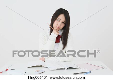 Japanese High-school student in uniform against white background View Large Photo Image Stock Image - Japanese High-school student in uniform against white background. Fotosearch
