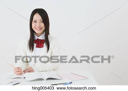 Japanese High-school student in uniform against white background View Large Photo Image Stock Image - Japanese High-school student in uniform against white background. Fotosearch