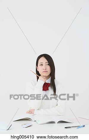Japanese High-school student in uniform against white background View Large Photo Image Stock Image - Japanese High-school student in uniform against white background. Fotosearch