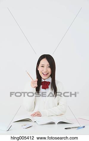Japanese High-school student in uniform against white background View Large Photo Image Stock Image - Japanese High-school student in uniform against white background. Fotosearch