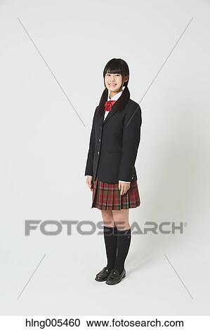 Japanese High-school student in uniform against white background View Large Photo Image Stock Image - Japanese High-school student in uniform against white background. Fotosearch